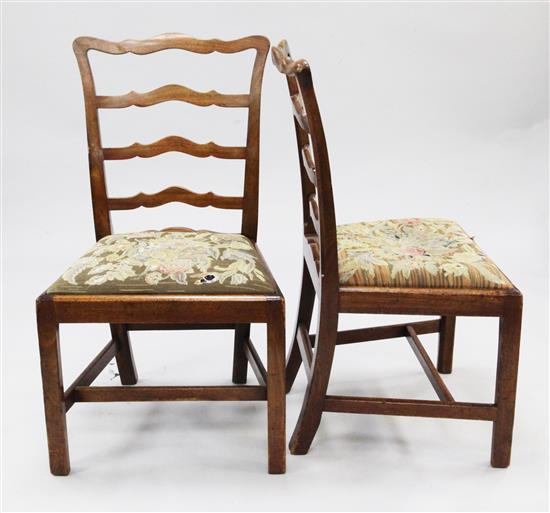 A set of five George III mahogany ladderback dining chairs & 2 similar